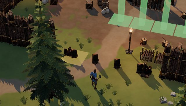 Build mode at the start of a game: green ghost stakes of a new palisade line laid across a gap in the refuge's wall, the keeper with a hammer by a pine, stumps, a torch post and stacked logs by the stakes.
